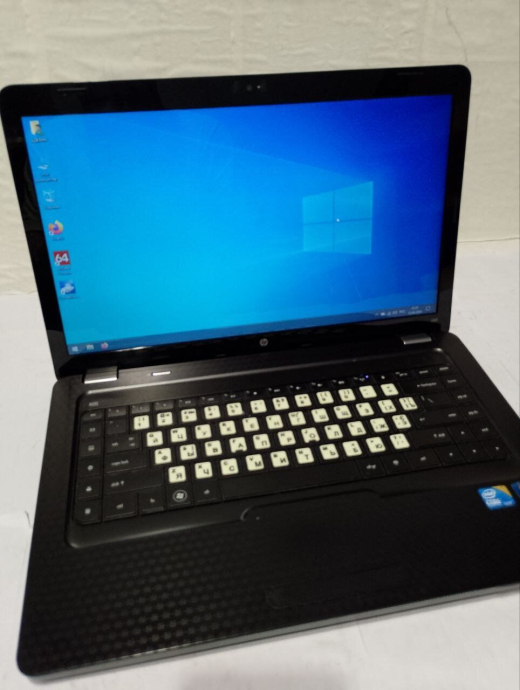 Ноутбук HP G62-a11SD / 15.6&quot; (1366x768) TN / Intel Core i3-350M (2 (4) ядра по 2.26 GHz) / 4 GB DDR2 / 500 GB HDD / Intel HD Graphics / WebCam - 2