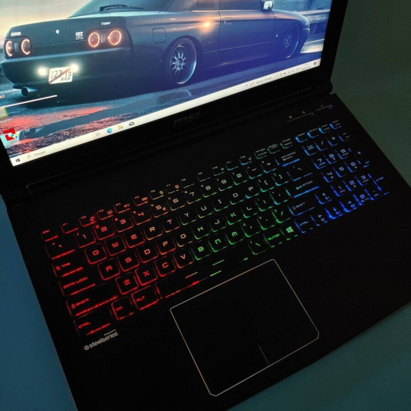 Ігровий ноутбук MSI GE62 2QF Apache Pro / 15.6 &quot; (1920x1080) IPS / Intel Core i7-5700HQ (4 (8) ядра по 2.7-3.5 GHz) / 16 GB DDR3 / 128 GB SSD + 1000 Gb HDD / nVidia GeForce GTX 970M, 3 GB GDDR5, 192-bit / WebCam / DVD-ROM / Win 10 Home - 6