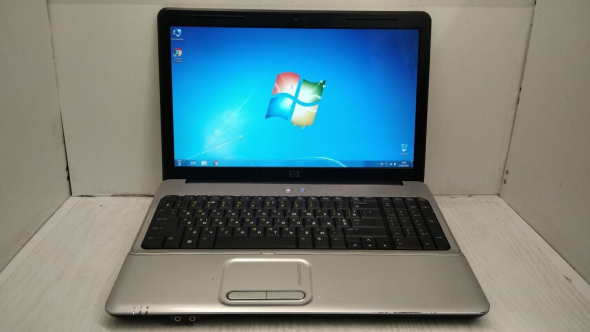 Ноутбук Б-класс HP G60-635DX / 15.6&quot; (1366x768) TN / Intel Pentium T4300 (2 ядра по 2.1 GHz) / 4 GB DDR2 / 250 GB HDD / Intel GMA 4500M Graphics / WebCam - 2