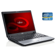 Нетбук Fujitsu LifeBook P702 / 12.1" (1280x800) TN / Intel Core i5-3230M (2 (4) ядра по 2.6 - 3.2 GHz) / 8 GB DDR3 / 500 GB HDD / Intel HD Graphics 4000 / WebCam / Win 10 - 1